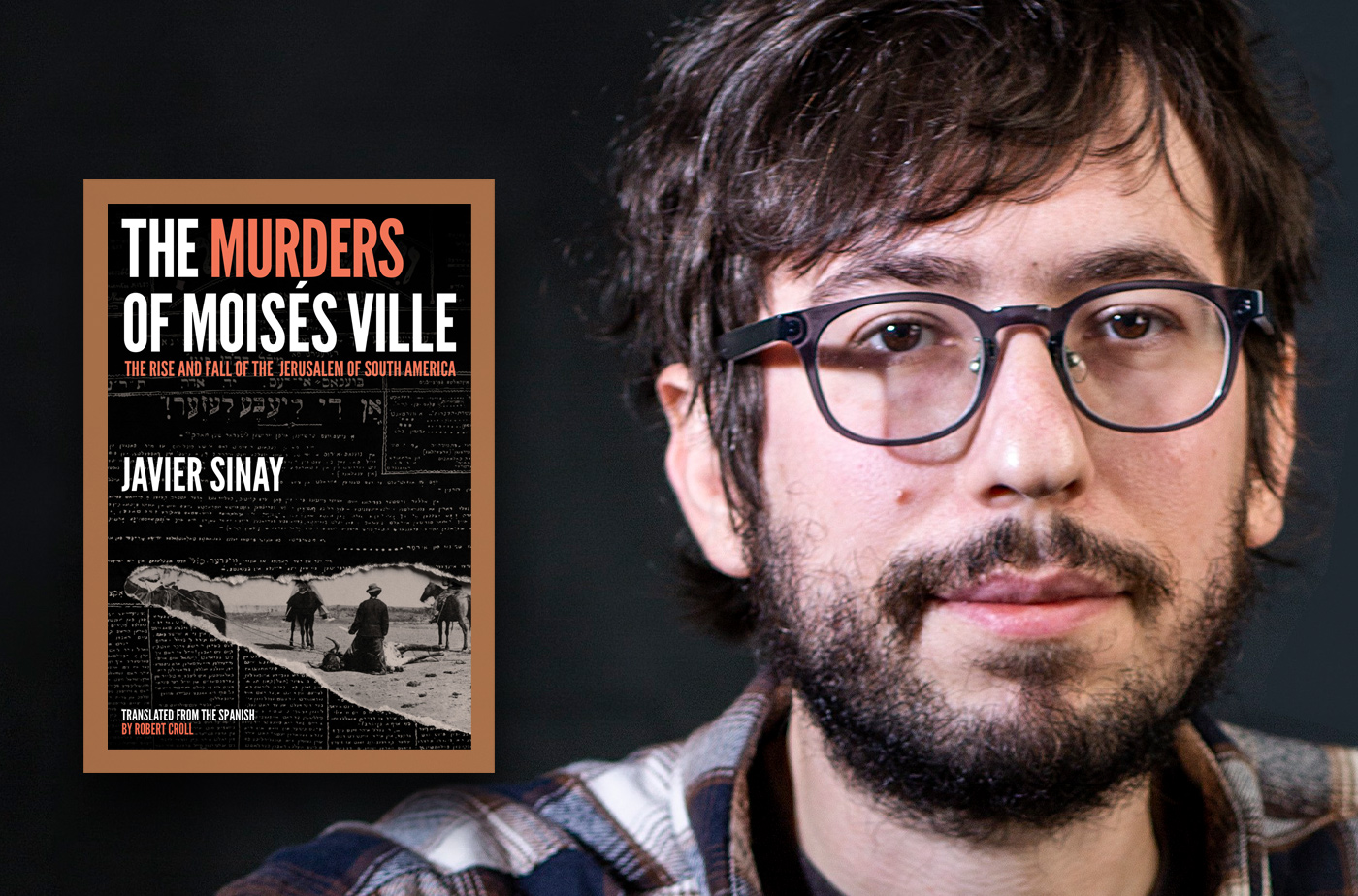 Photo of Javier Sinay with the cover of "The Murders of Moises Ville"